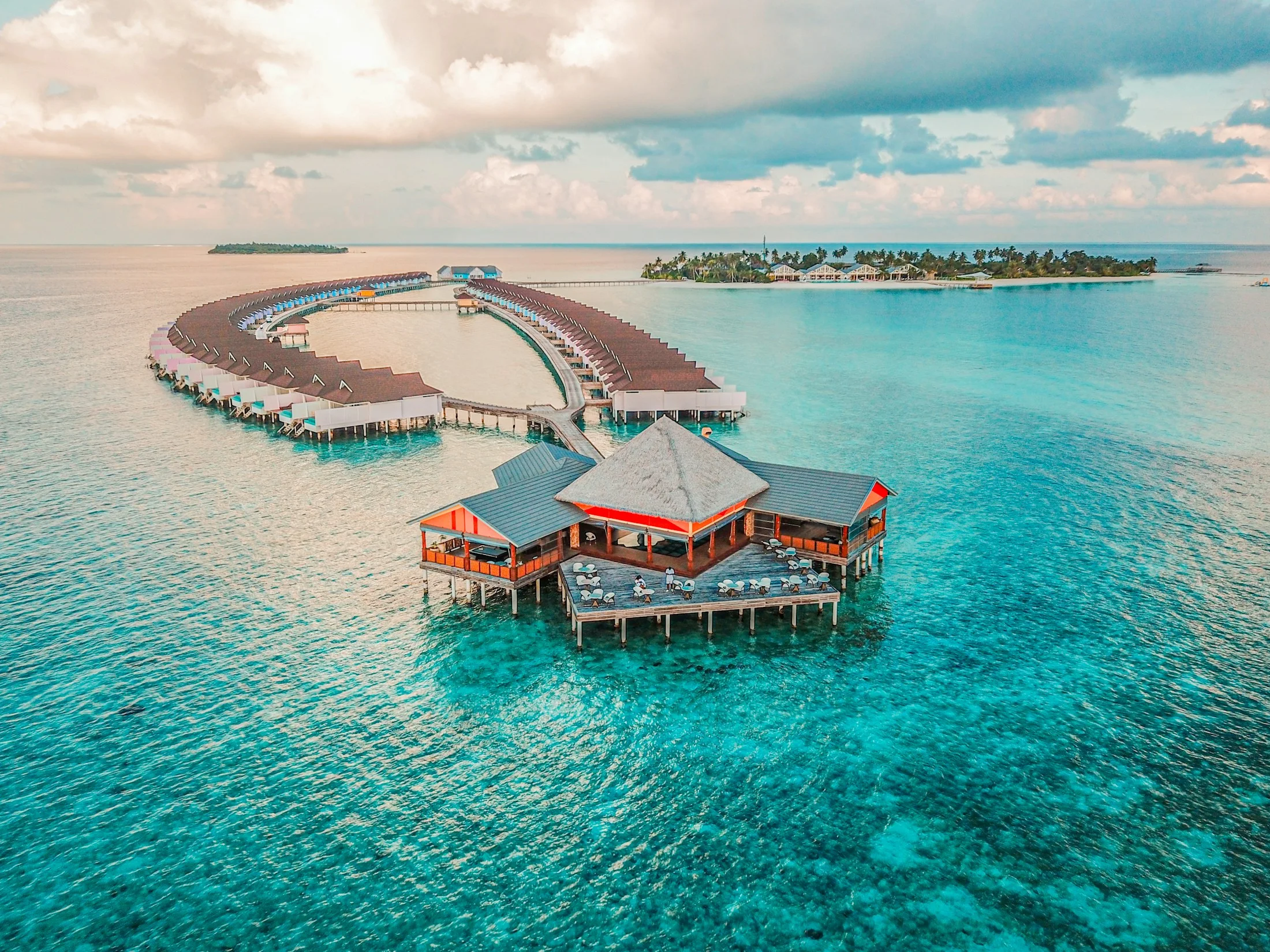 Luxury overwater resort at sunset